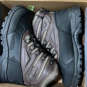 New boots in box with tags